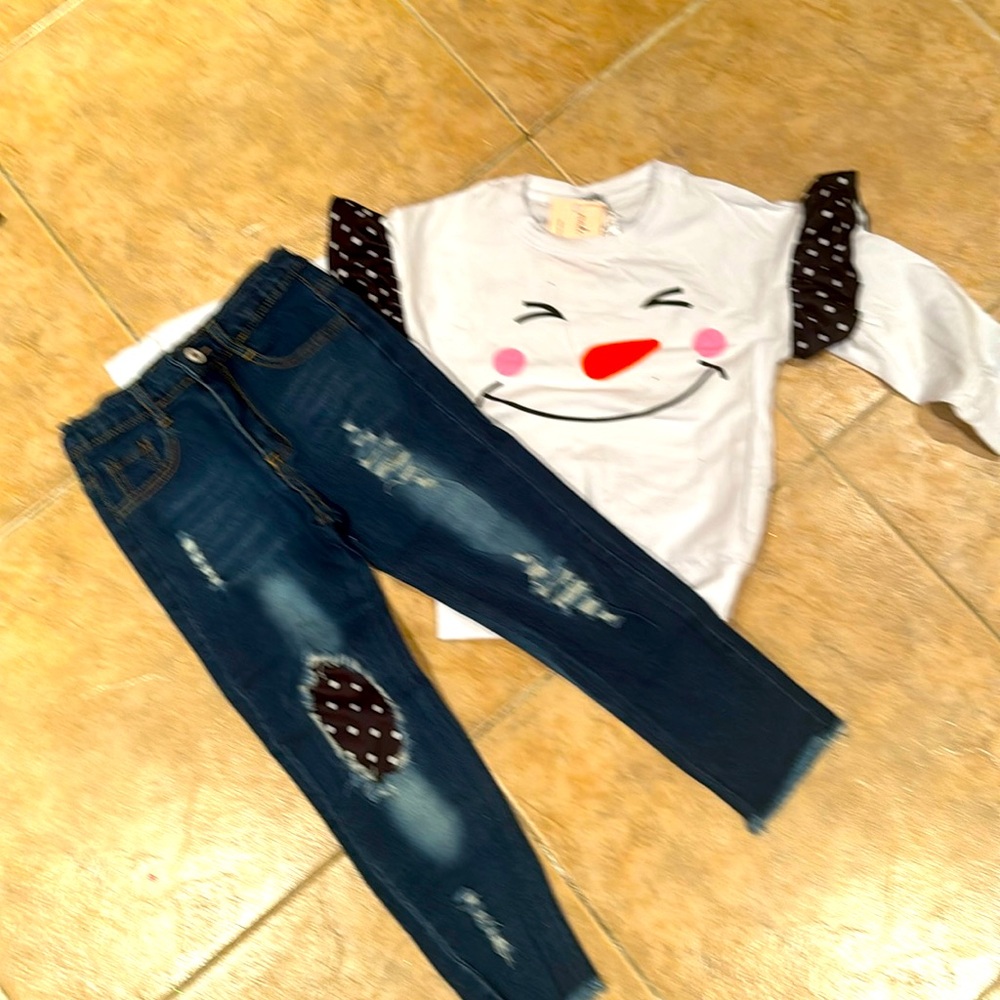 Girls winter outfit. Snowman top with matching jeans